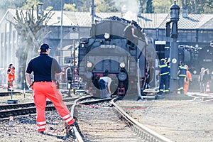 Bochum , Germany - April 18 2015 : Worker observing the activities at the railway main station