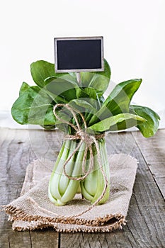 Bock Choy on a rustic wooden background