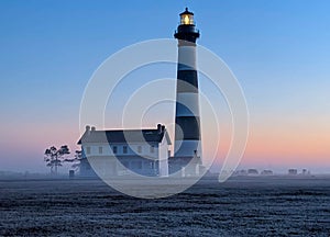 Bodie Island Lighthouse in Fog at Sunrise on Outer Banks North Carolina