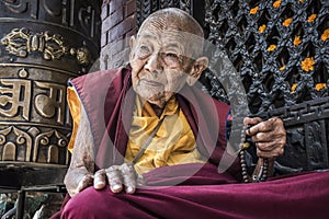 Portrait of an old Buddhist nun from kathmandu, Nepal.