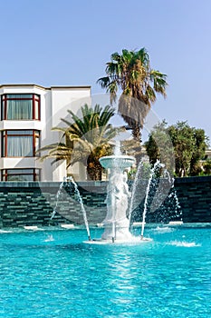View of the fountain and swimming pool at the 5-star Samara Hotel, near Bodrum.