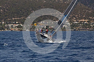 Sailing in the wind through the waves at the Sea.