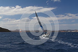 Sailing in the wind through the waves at the Sea.