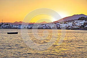 Bodrum, Turkey. View of the city, mountains and shore of the Aegean Sea with cafes and restaurants at sunset