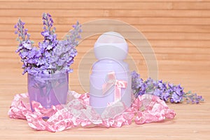 Body antiperspirant deodorant roll-on with flowers in the cap