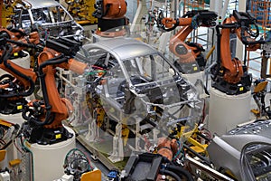 Body of car on conveyor top view. Modern Assembly of cars at the plant. The automated build process of the car body