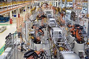 Body of car on conveyor top view. Modern Assembly of cars at the plant. The automated build process of the car body