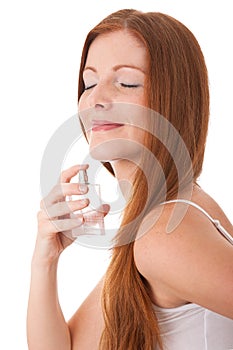 Body care - Young woman enjoy smell of perfum