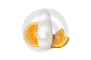 Body deodorants roll-on and orange slices isolated on background