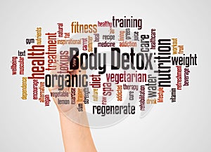 Body Detox word cloud and hand with marker concept