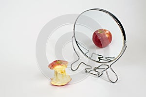 Eating Disorder Anorexia Bulimia Apple in Mirror photo