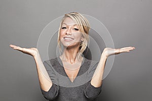 Body language concept for satisfied 20s blond woman photo