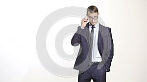 Body language. man in business suit isolated white background. Training managers. sales agents. look over his glasses