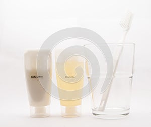 Body Lotion,Shampoo and teeth brush on background