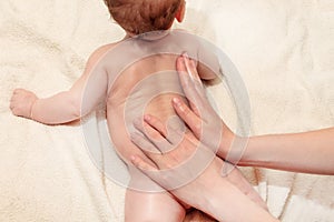 Body massage for the baby, warm-up for the newborn, the development of the musculoskeletal system in children