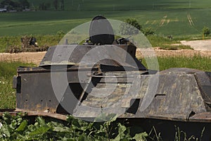 The body of a military tank on a battlefield