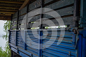 Old blue rusty truck body photo