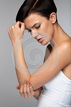 Body Pain. Beautiful Woman Feeling Pain In Elbows, Painful Arm