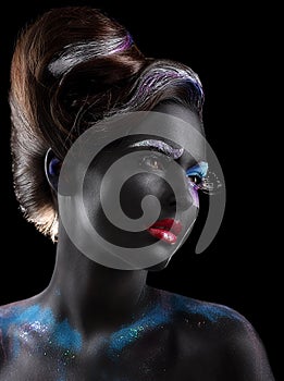 Body-painting. Fantasy. Woman with Fantastic Stagy Makeup over Black