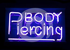 Body piercing neon sign
