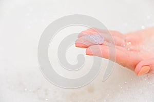 Body scrub with exfoliating particles. Selective focus. Closeup