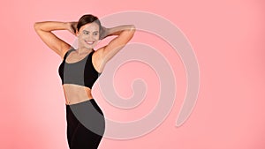 Body Sculpting. Happy Beautiful Sporty Woman In Activewear Posing On Pink Background