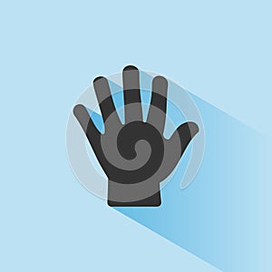 Body senses tact. Hand icon with shade on blue background photo