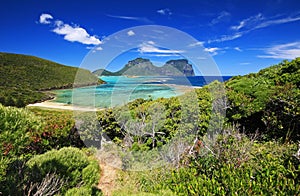 a body of water with a mountain in the background from kims lookout on Lord Howe Island in Australia
