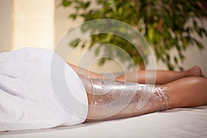 Body wrapping in spa room