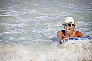 Bodyboarder surfing a wave