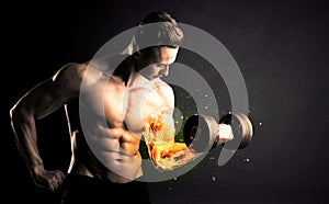 Bodybuilder athlete lifting weight with fire explode arm concept