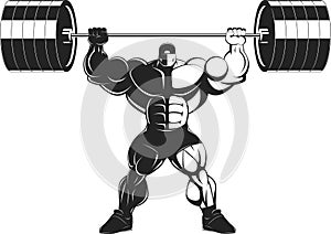 Bodybuilder with a barbell photo