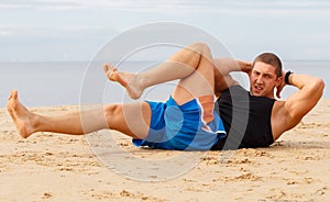 Bodybuilder on the beach