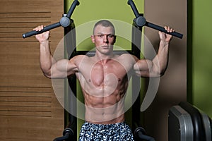 Bodybuilder Doing Pull Ups Best Back Exercises