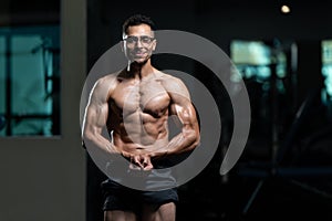 Bodybuilder With Gynecomastia Problem Flexing Muscles