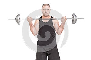 Bodybuilder lifting heavy barbell weights