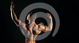 Bodybuilder man with muscular torso back and hands