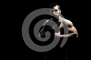 Bodybuilder Soldier With Bulletproof Vest on Black Background