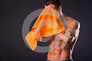 Bodybuilder with a towel