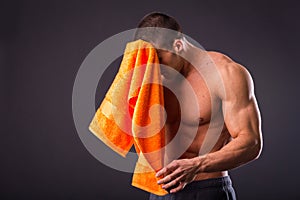 Bodybuilder with a towel