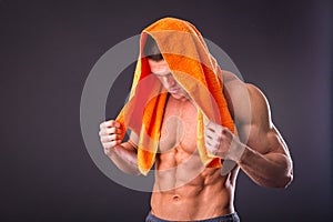 Bodybuilder with a towel