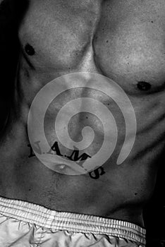 Bodybuilders six pac closeup photo