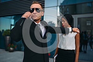 Bodyguard requests support for client protection photo