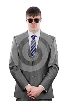 Bodyguard wearing a suit and sunglasse photo