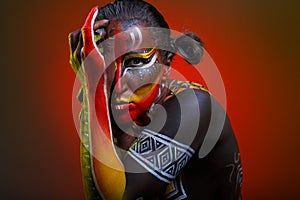 Bodypainting. Woman painted with ethnic patterns