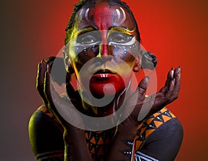 Bodypainting. Woman painted with ethnic patterns photo