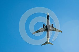 Boeing 737-800 flying overhead on approach to landing at Boston Logan airport