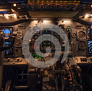Boeing 737 classic Cockpit during night time operation. All panels illuminated.