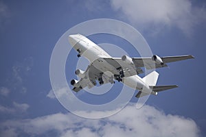 Boeing 747 airliner on final approach photo
