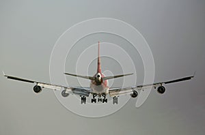 A boeing 747 rotating on the runway